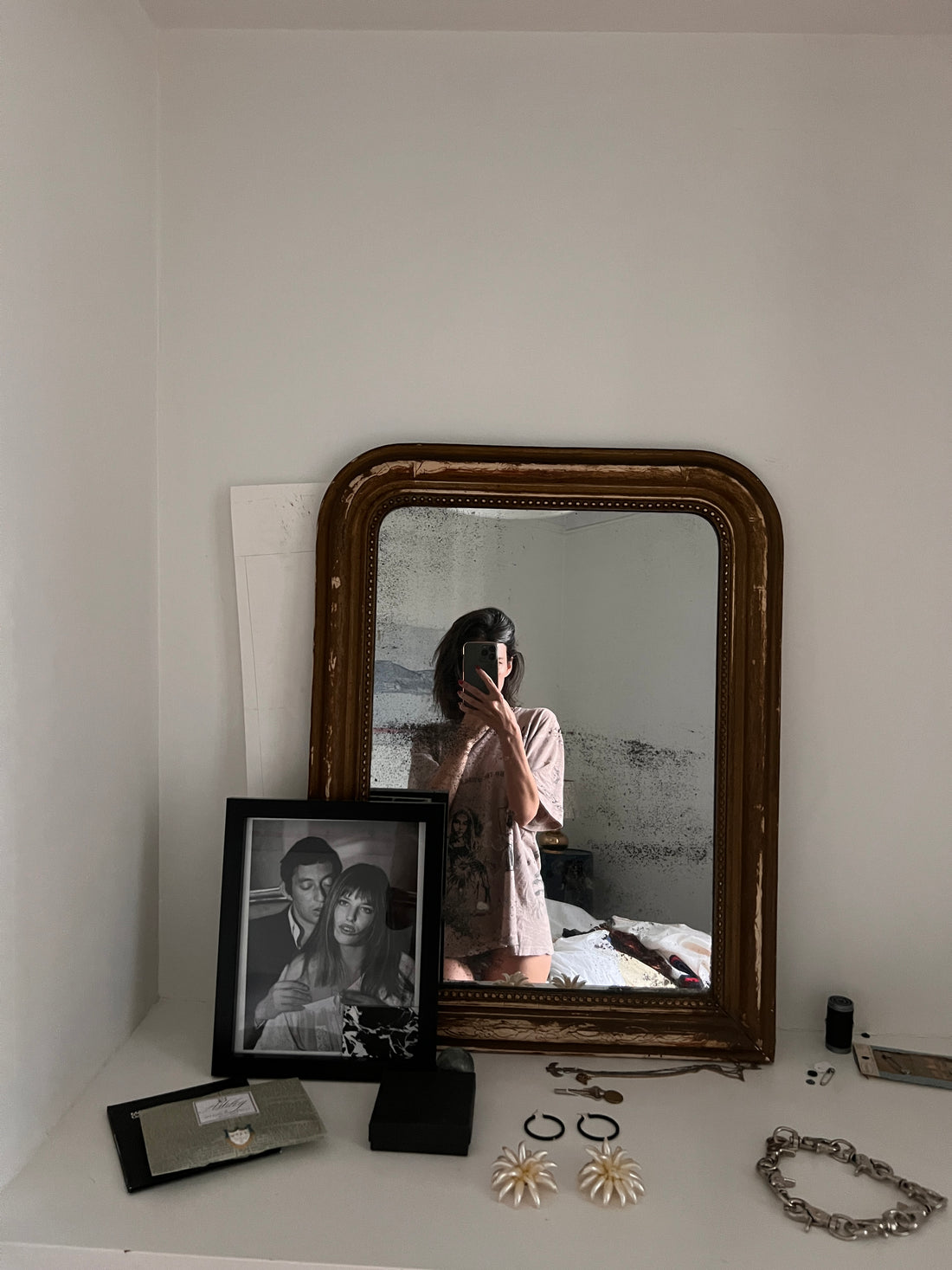 Ashley Pinkston in a mirror in Paris, the day Jane Birkin died.